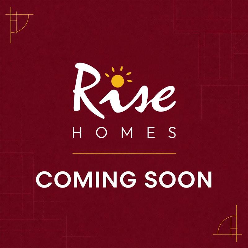 A maroon graphic features the words “Rise Homes” in crisp white lettering, highlighted by a yellow sun accenting the letter ‘i.’ Below, the phrase “COMING SOON” stands out in bold white text. Slim yellow lines embellish each corner, adding a refined touch to the overall design.