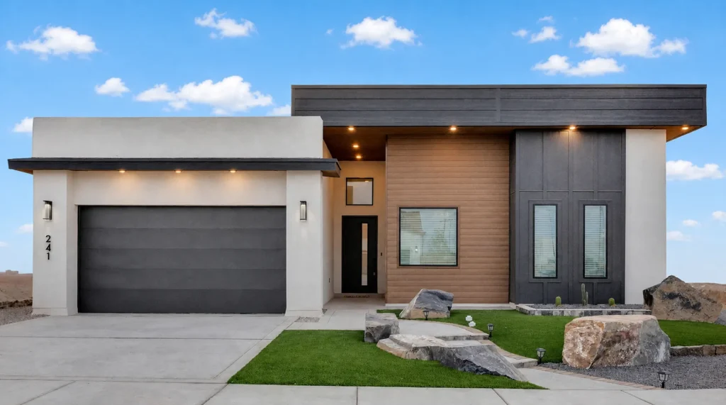 Britton Hill by Rise Homes with an asymmetrical flat roof, recessed entry, two-car garage, and mixed horizontal and vertical façade panels.